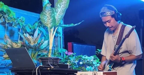 Dwi Sumantri performing live behind a keyboard — DWS Record brand case study